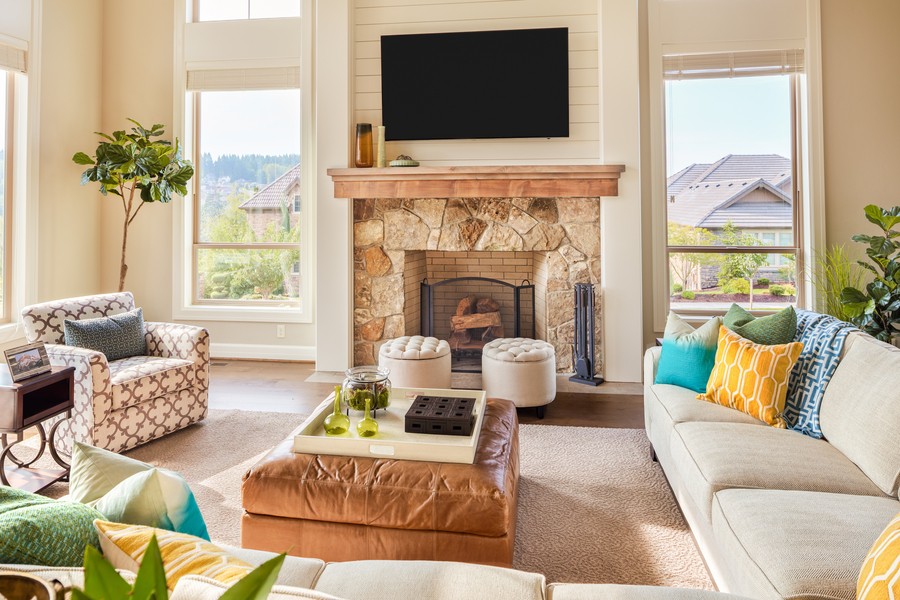 Living room with motorized window treatments