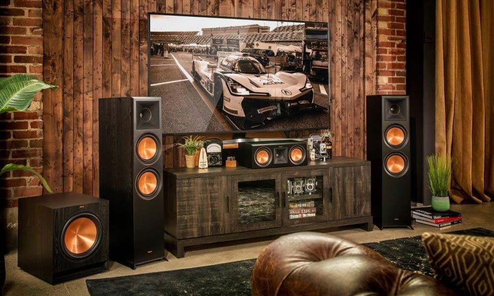 Speakers in front of wooden wall